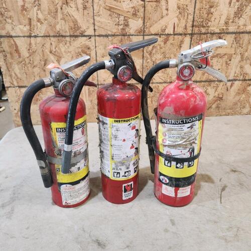 3 12" Charged fire extinguishers