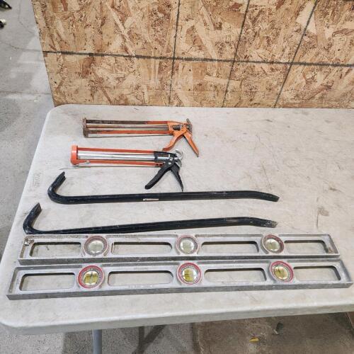 2- 28" levels, claw bars, caulking guns