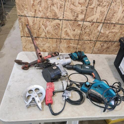 Various power tools, air nailer, chain binder