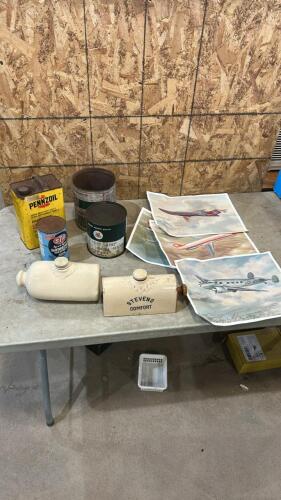 Oil tins, stoneware foot warmers, airplane prints