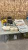 Oil tins, stoneware foot warmers, airplane prints