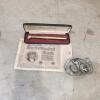 1923 German bank note, Snap-On tire guage, belt buckle