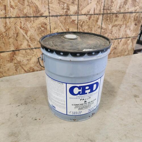 Part jug of pavement & concrete sealer