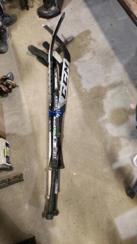 Various hockey sticks