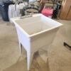 Plastic laundry tub w taps