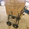 Metal garden hose reel on wheels