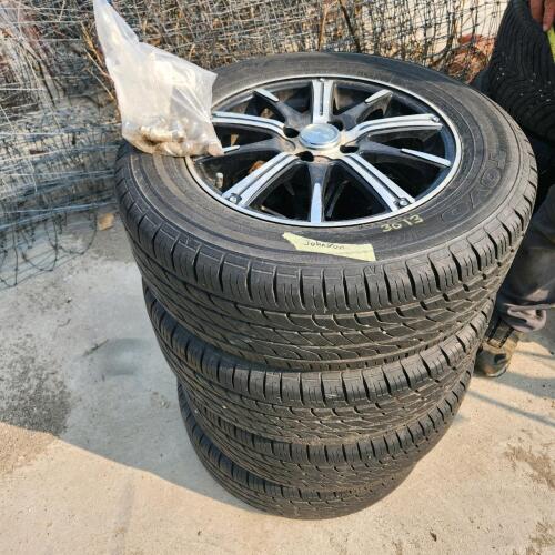 4 Alum wheels, 205/65R15, 80% thread