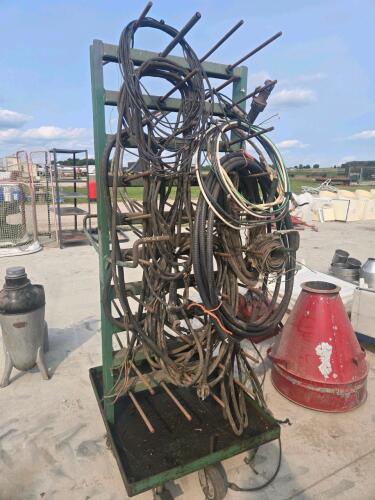 Steel rack w various sized heavy wiring