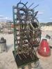 Steel rack w various sized heavy wiring