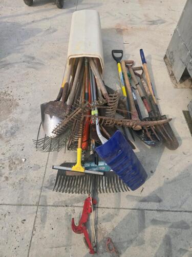 Shovels, rakes, pick, tree pruner, forks, etc.