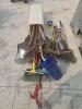 Shovels, rakes, pick, tree pruner, forks, etc.