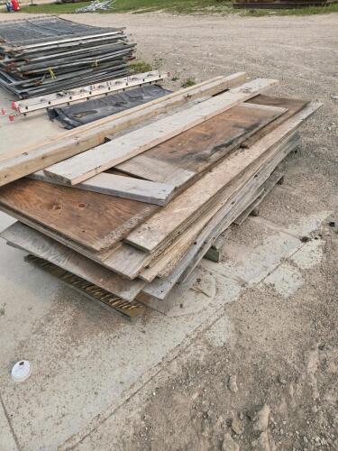 Pile of various sized used plywood