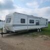 2001 35' Wildwood camper w ownership, needs work had damage in multiple places
