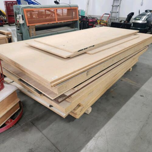 Lift of various melamine sheets out of retirement furniture shop