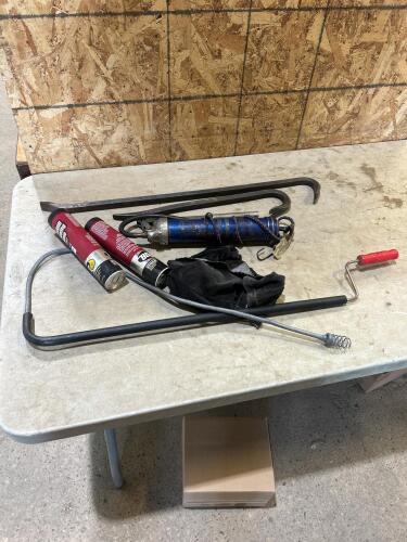 Grease gun, grease, crow bars, plumbing snake