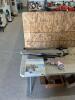 Fishing poles, alum bat, puzzle, light