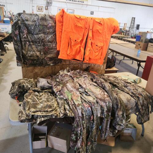 Various sized hunting clothes