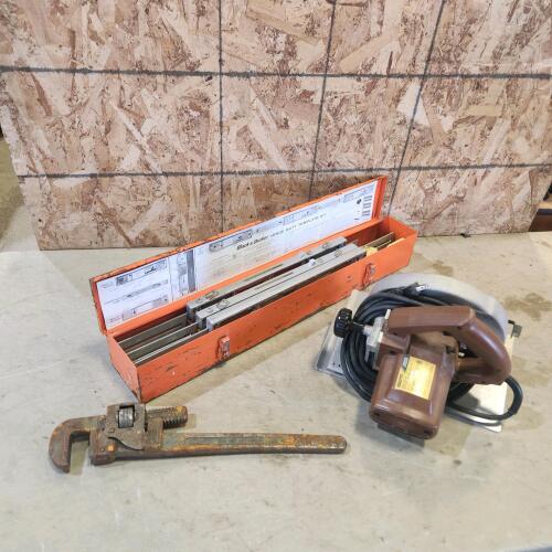 Pipe wrench, skilsaw, etc.