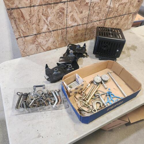 Tiller tines, muffler, assorted safety clips, etc.