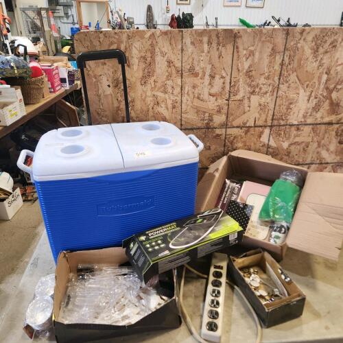 Rubbermaid cooler, plastic cutlery, power bar, charging mat, etc.