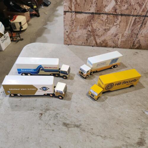 4 8" L Diecast transport trucks
