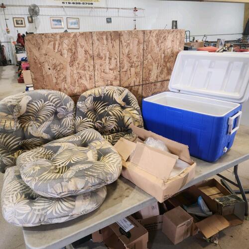 Garbage bags, cooler, cushions