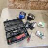 Die grinder, travel mugs, video camera, 1951 mercury