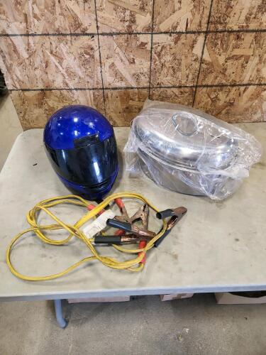 Booster cables, motorcycle helmet, roasting pan