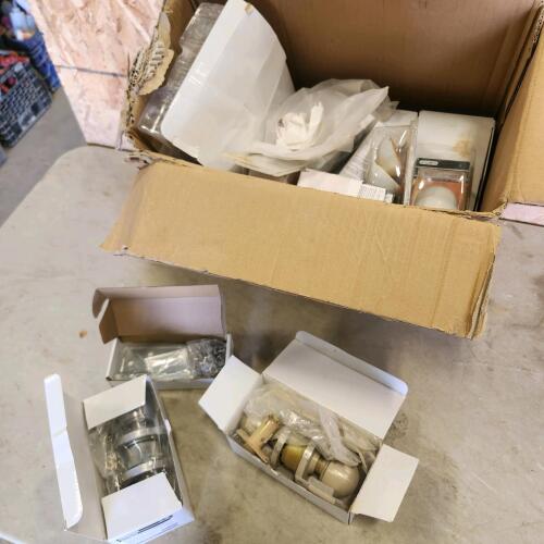 Assorted door knobs and hinges