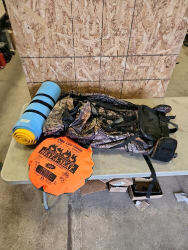 Camo backpack, heated cushion, foam pads