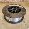 Nearly full roll of mig wire 0.9mm
