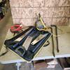 Hand saws, claw bars, booster cables, light