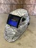 Auto darkening welding mask