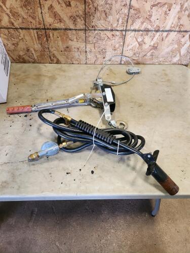 Cable come along, propane torch