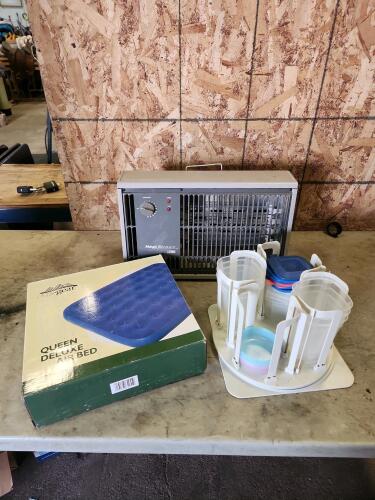 Heater, queen size air mattress, lazy susan w plastic dishes