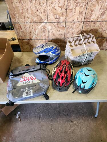 26 egg cartons, bike helmets, Coors back pack