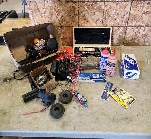 powder chalk, safety glasses, used lock, etc