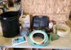 14.4V light w battery & charger, part jug sodium 300 herbicide, lawn decor, various hoses