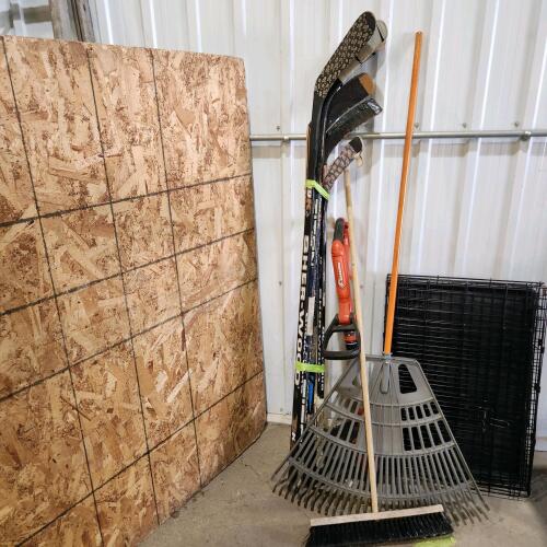 Rake, broom, electric trimmer, hockey sticks, pet crate