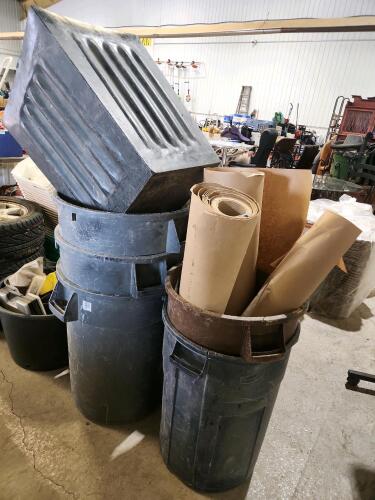 Rolls of construction paper, 5 rubbermaid garbage bins, planter