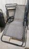 2 Folding lounge chairs