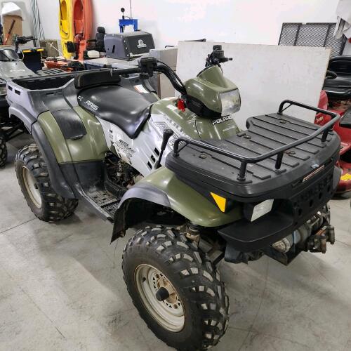 2004 Polaris 500 four wheeler, 4x4, milage unknown, rear dump box, running order w ownership
