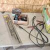 4 pc pry bar set, LED work light, 2 stroke oil, booster cables