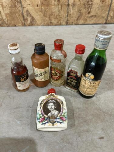 Various part bottles of vintage liquor