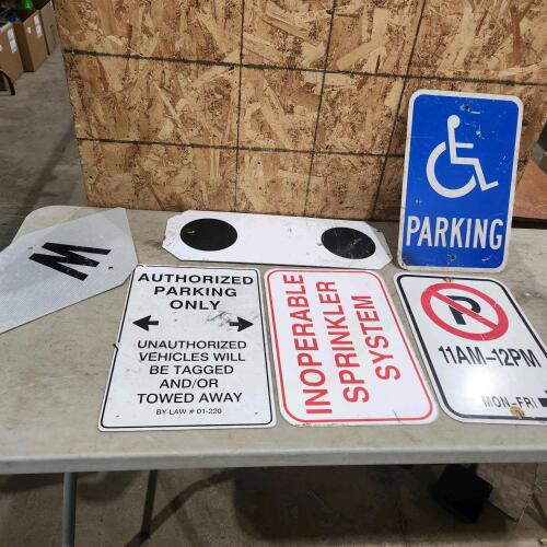 Assorted metal signs
