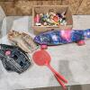 Baseball gloves, kids toys, skateboard