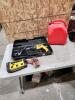 Klein multimeter, hammer drill, gas can