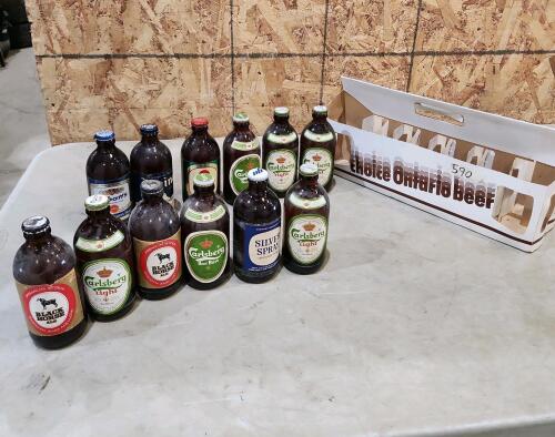 12 Sealed bottles of vintage stubby beer