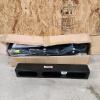 Unused pickleball net and flushmount light housing
