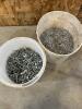 Pail of 2&rdquo; roofing nails, pail of 1 1/4&rdquo; nails